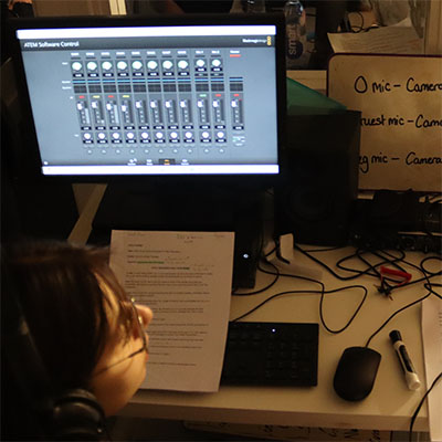 Photograph of students producing a podcast