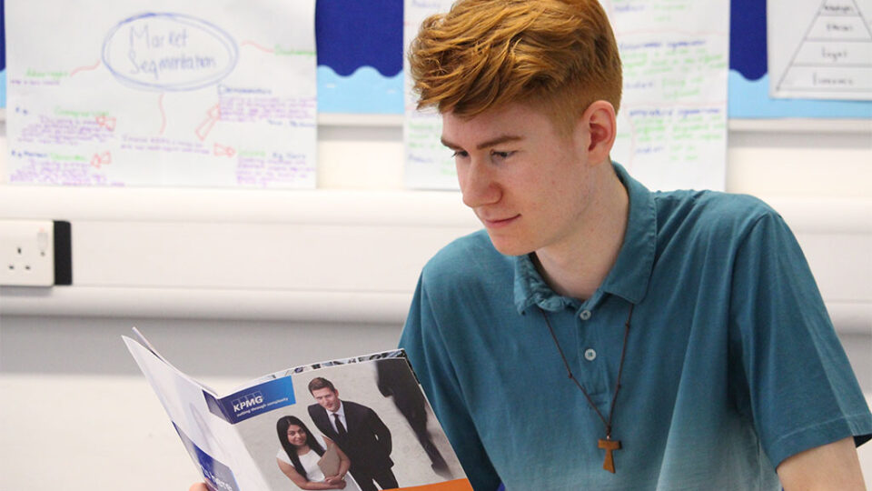 Photograph of an accounting student reading a book.