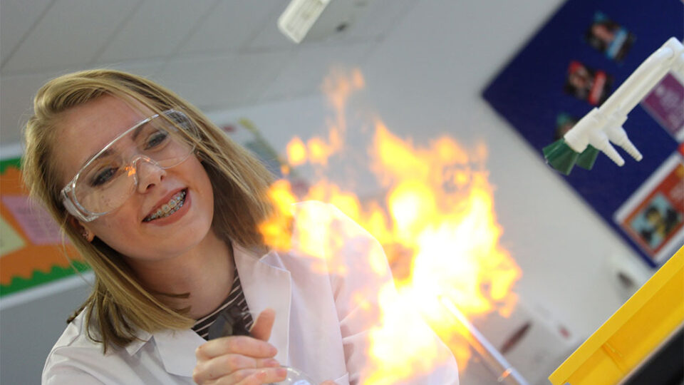 Photograph of an applied science student conducting an experiment