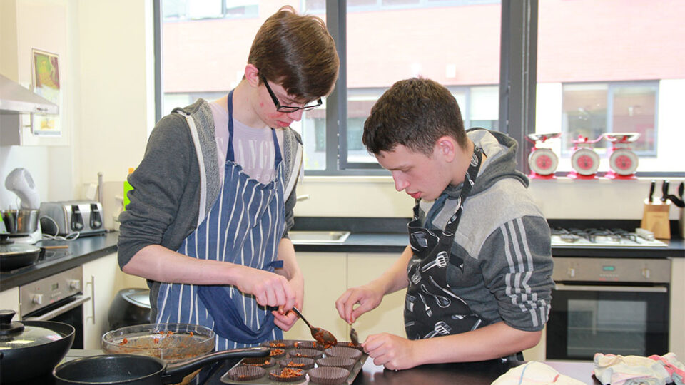 Photograph of Pathways students in the teaching kitchen